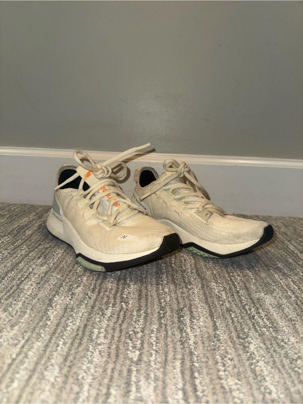 New Balance Men’s Cream Athletic Sneakers with Black Accents